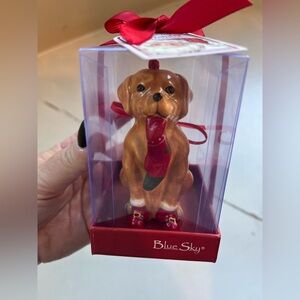 Blue Sky Dog holding a stocking Christmas Tree Ornament